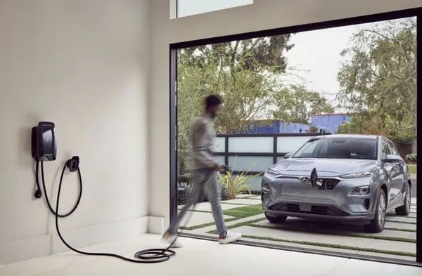 Dwelling Electric Logo