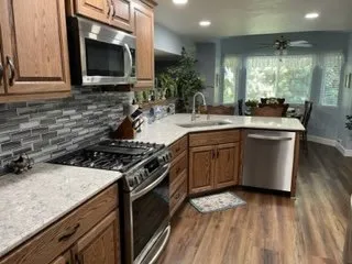 Dynamic Building and Restoration Logo