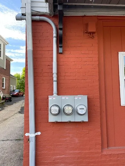 Expert electrician providing panel upgrade in Manville, RI - Dynamic Electric