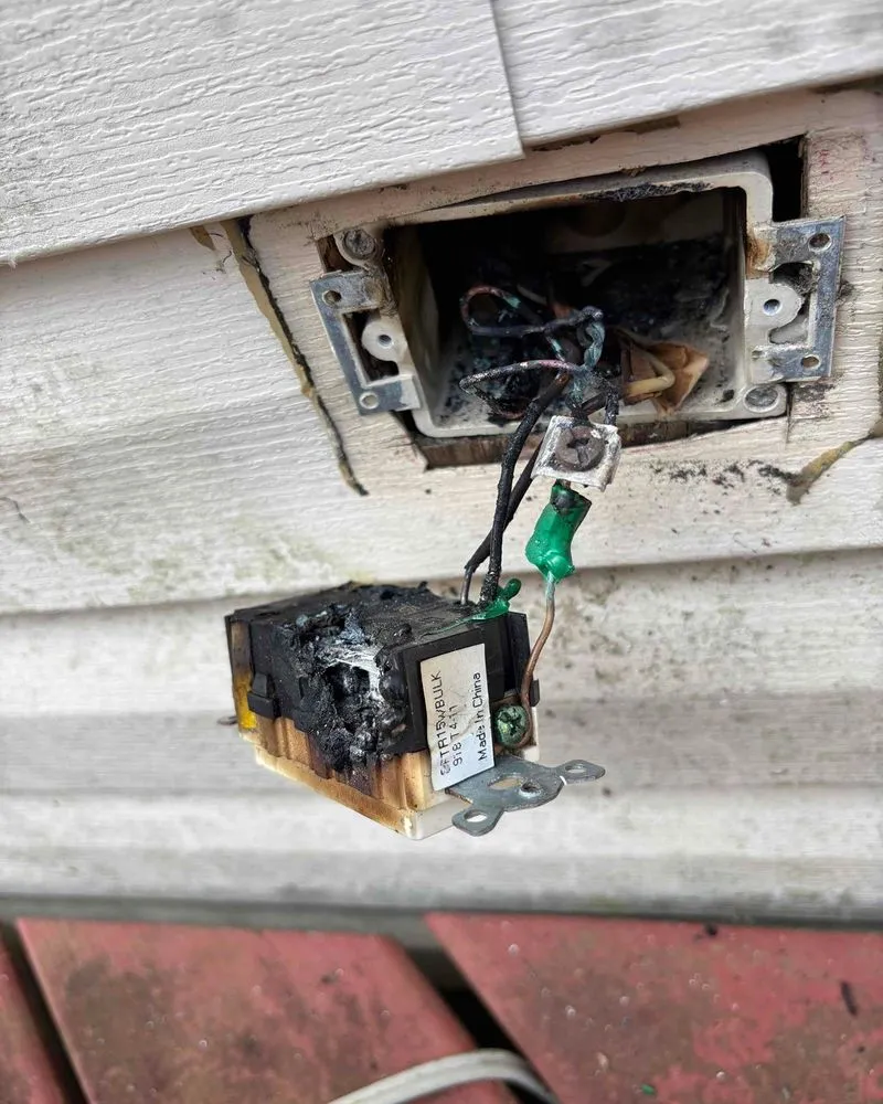 Professional electrician providing outlet and switch repair in ,