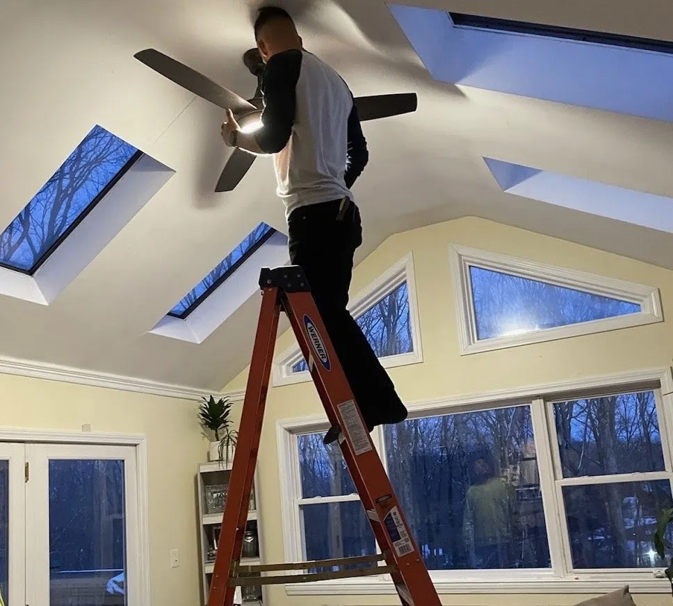 Professional electrician providing panel upgrade in ,