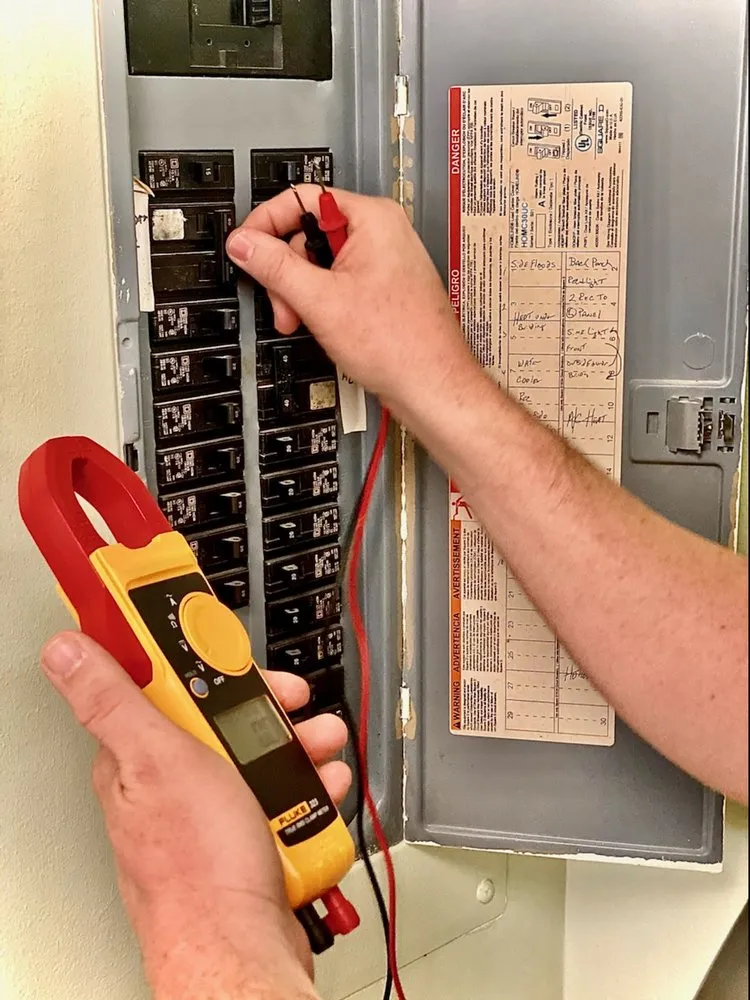 Professional electrician providing emergency electrical service in , 