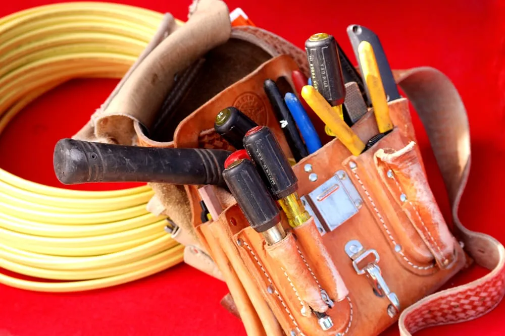 Professional electrician providing outlet and switch repair in Elmhurst, NY - Eddy Electric