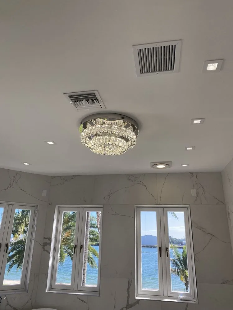 Slide of Electric Rex Services