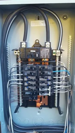 Licensed electrician providing panel upgrade in ,