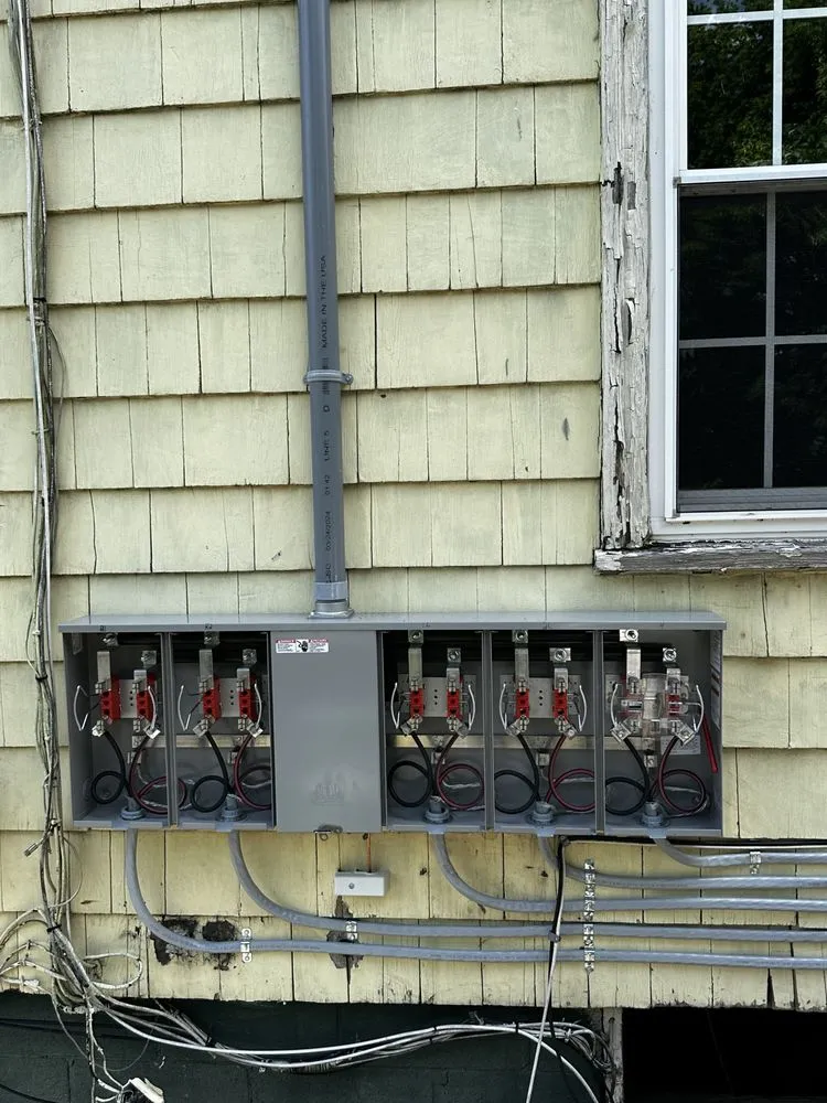 Professional electrician providing outlet and switch repair in , 