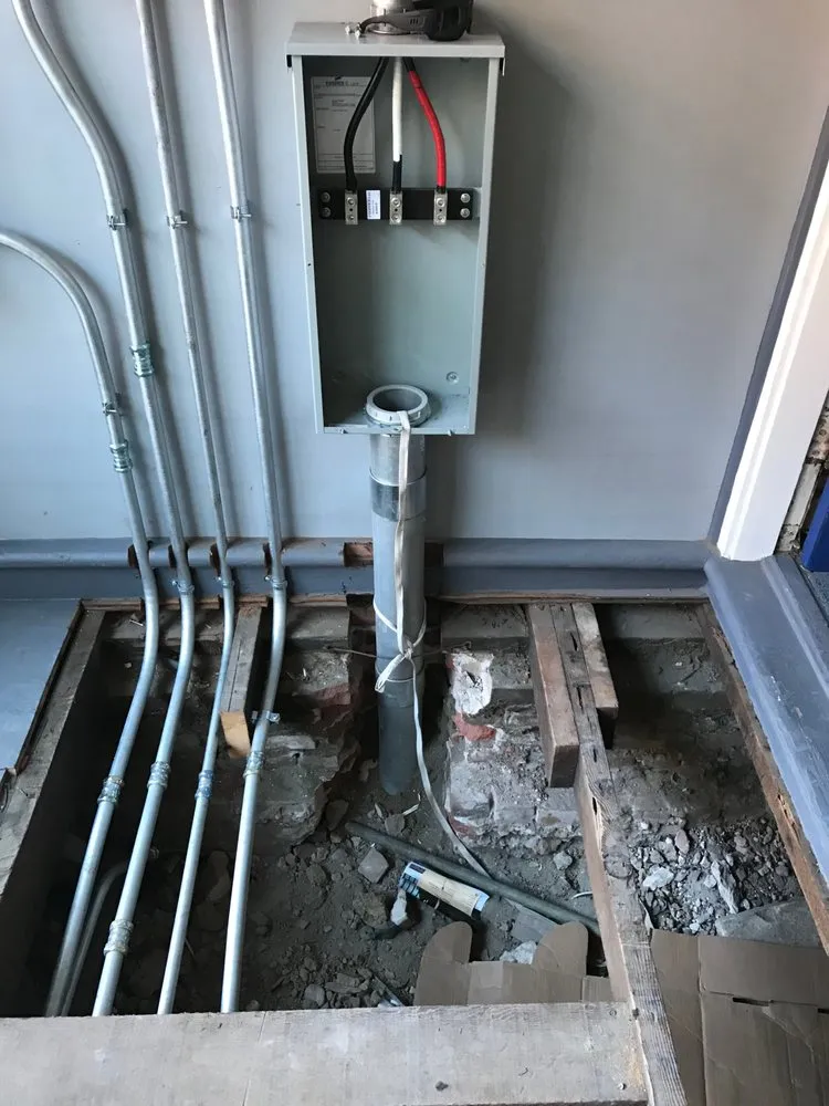 Professional electrician providing panel upgrade in , 