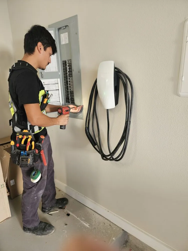 Professional electrician providing circuit breaker repair in ,