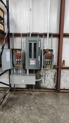 Elite Home Electric Logo