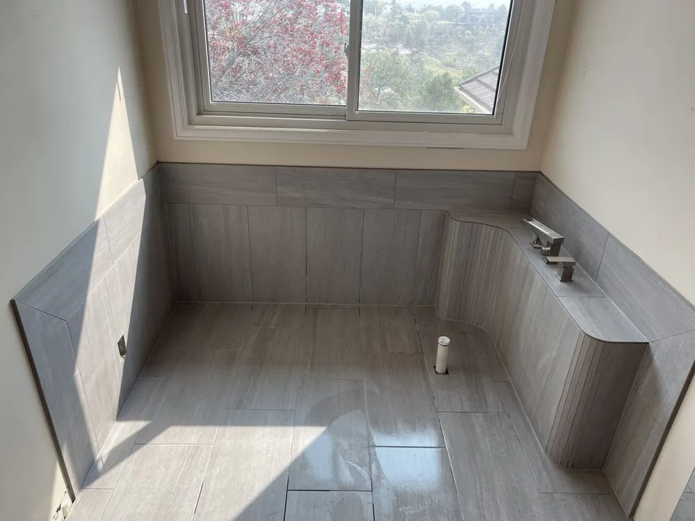 Slide of Epic Customs Tile And Stone