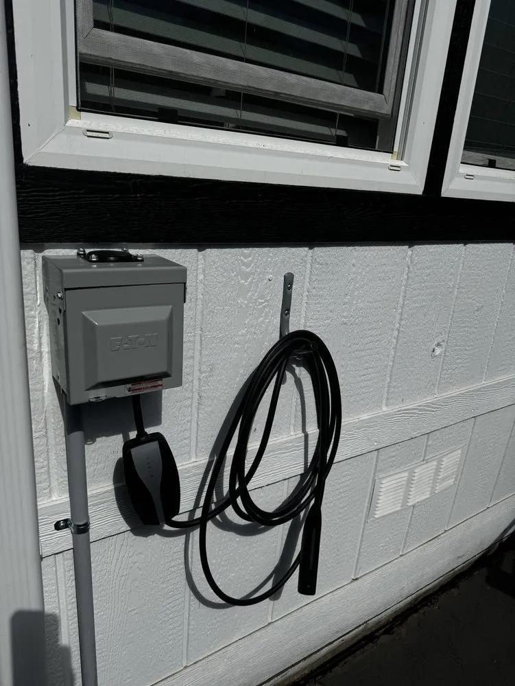 Slide of Eric's Lighting and Electrical Service