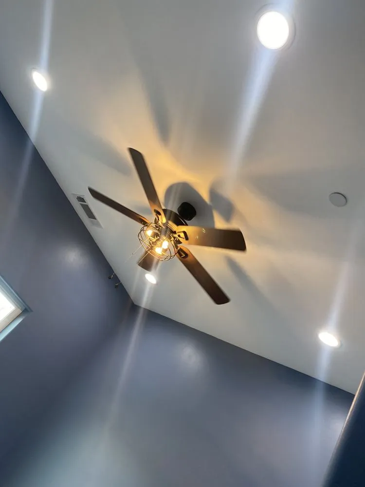 Slide of Erin Sons Electric