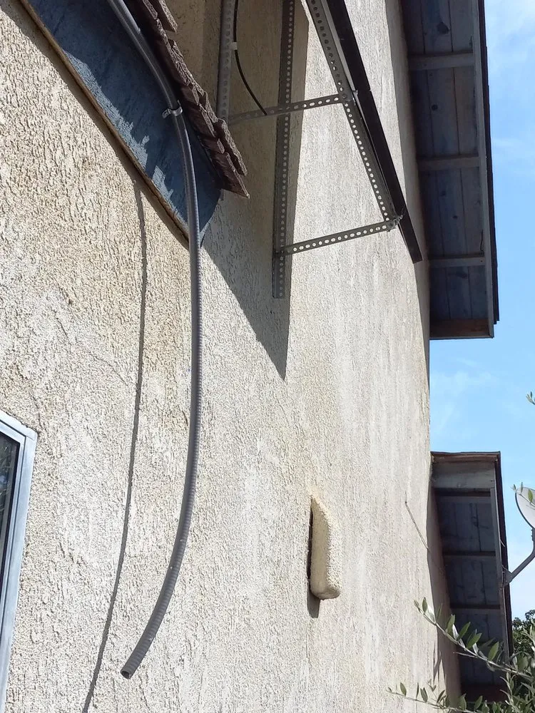 Slide of Erin Sons Electric