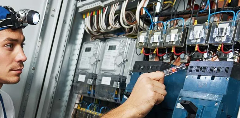 Professional electrician providing panel upgrade in , 