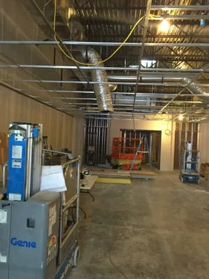 Excellence Drywall Construction Logo