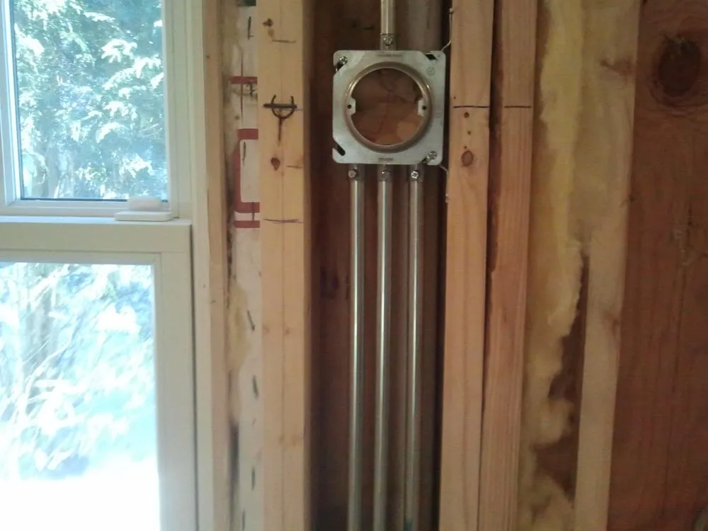 Slide of Father and Son's Electrical