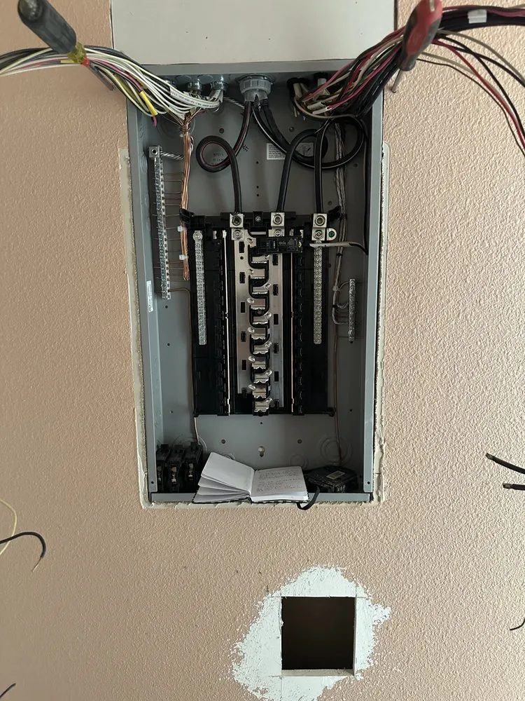 Expert electrician providing panel upgrade in ,