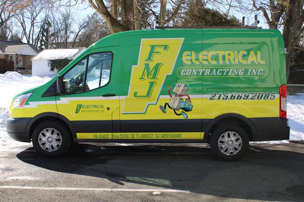 Slide of FMJ Electrical Contracting