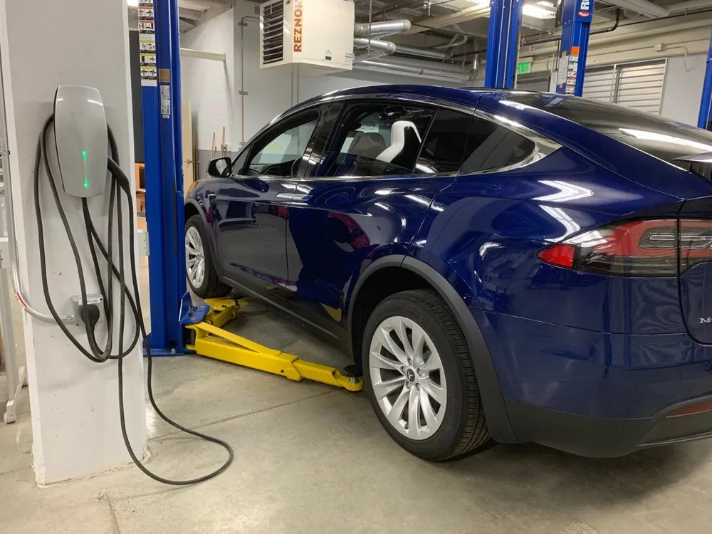 Expert electrician providing panel upgrade in ,