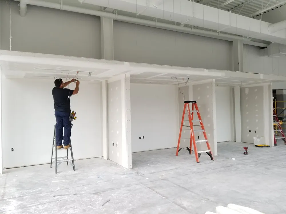 Slide of Genesis Lighting + Electric