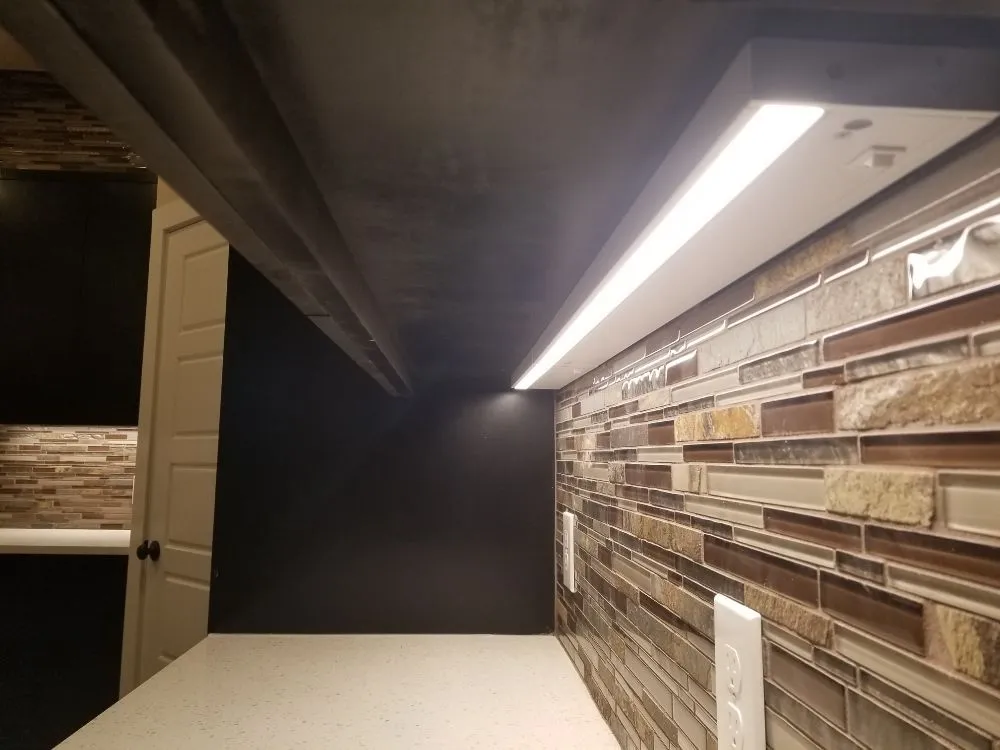 Professional electrician providing lighting installation in ,