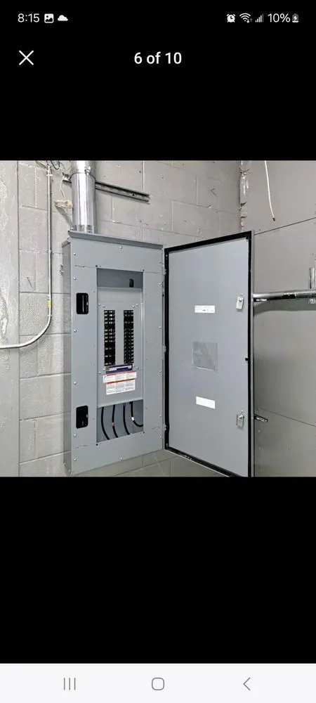Emergency electrician providing panel upgrade in ,