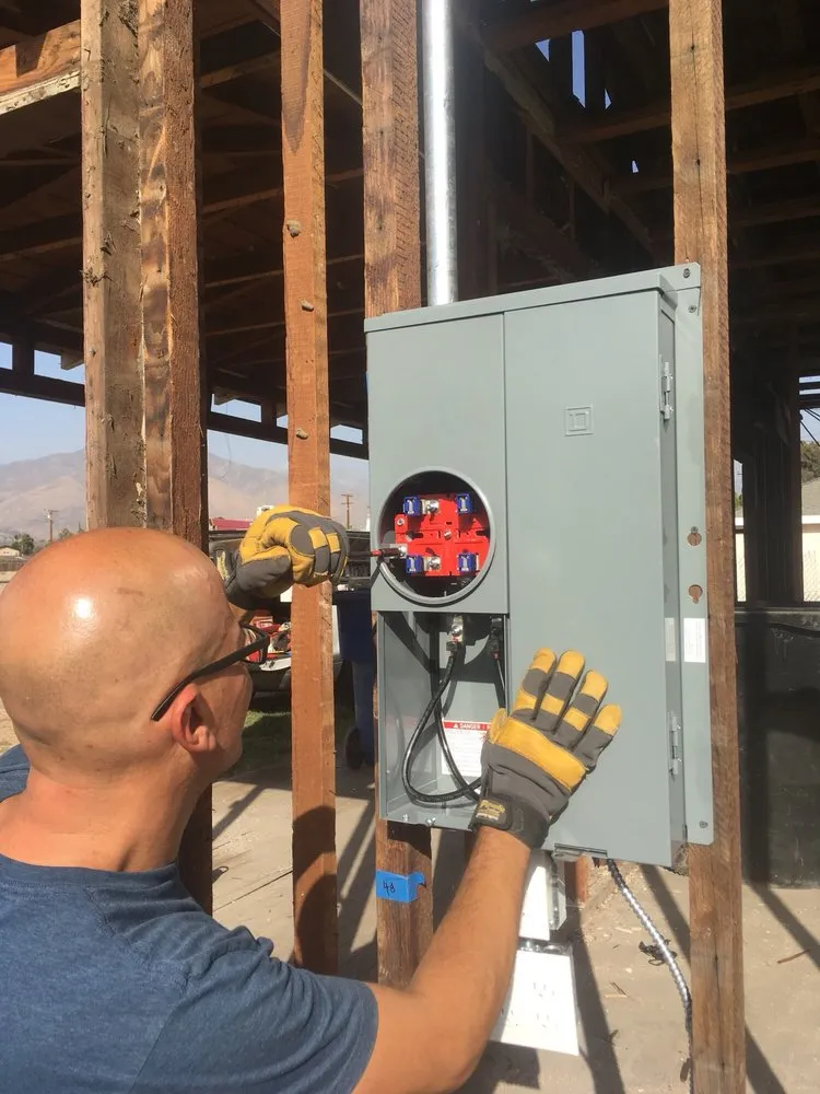 Licensed electrician providing panel upgrade in , 