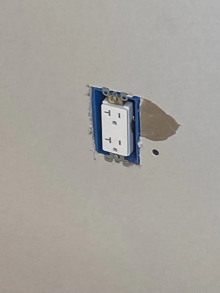 Slide of Gus's Electrical Services