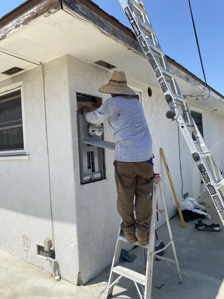 Slide of Gus's Electrical Services