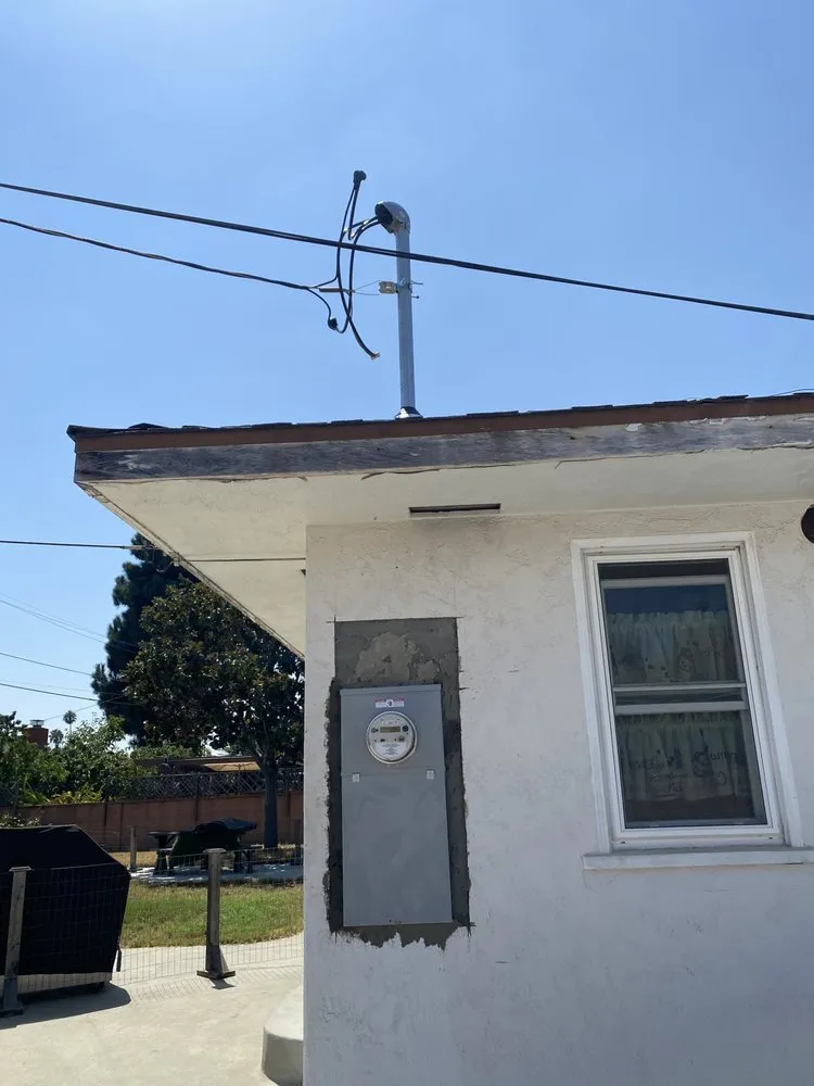 Slide of Gus's Electrical Services