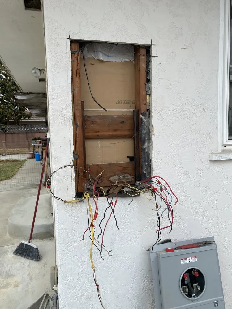 Slide of Gus's Electrical Services