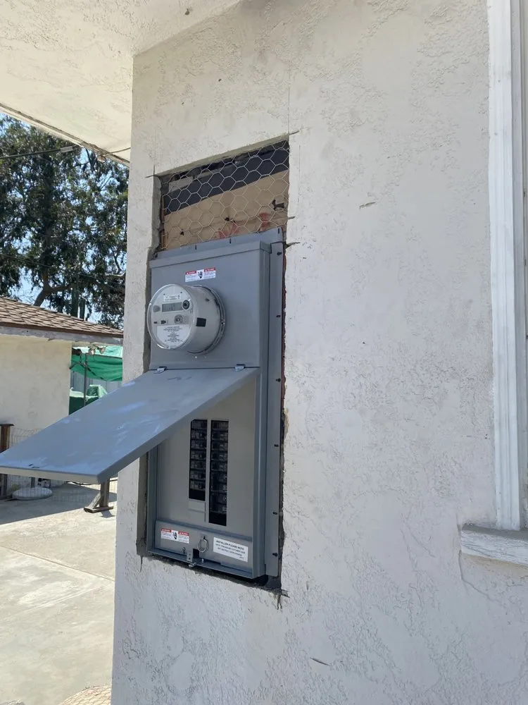 Slide of Gus's Electrical Services