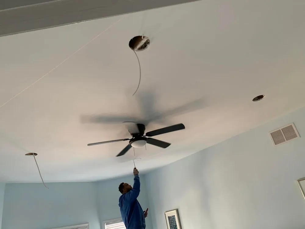 Licensed electrician providing lighting installation in Beltsville, VA - Guzman Power Solutions