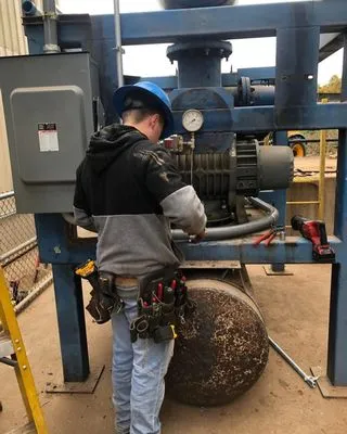 Harrison's Electric Logo