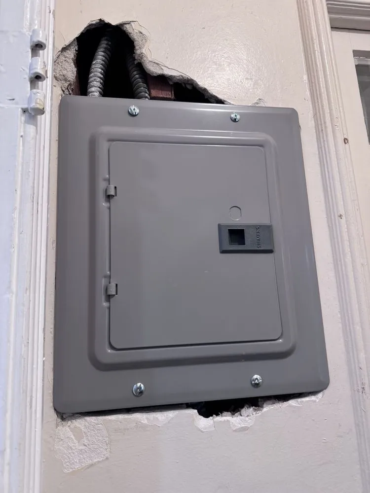 Professional electrician providing emergency electrical service in ,