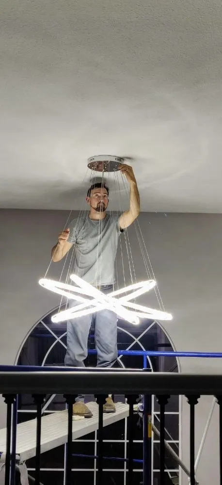 Professional electrician providing outlet and switch repair in ,