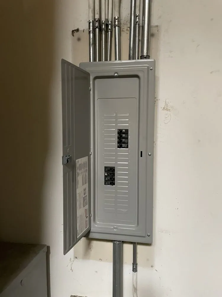 Licensed electrician providing panel upgrade in , 