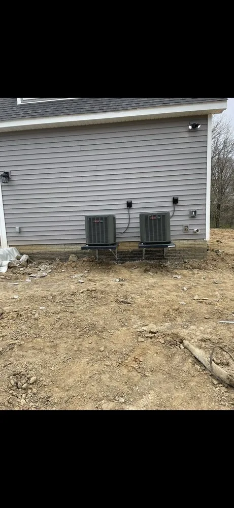 Professional electrician providing wiring installation in Mansfield, IL - Heiser Heating And Air