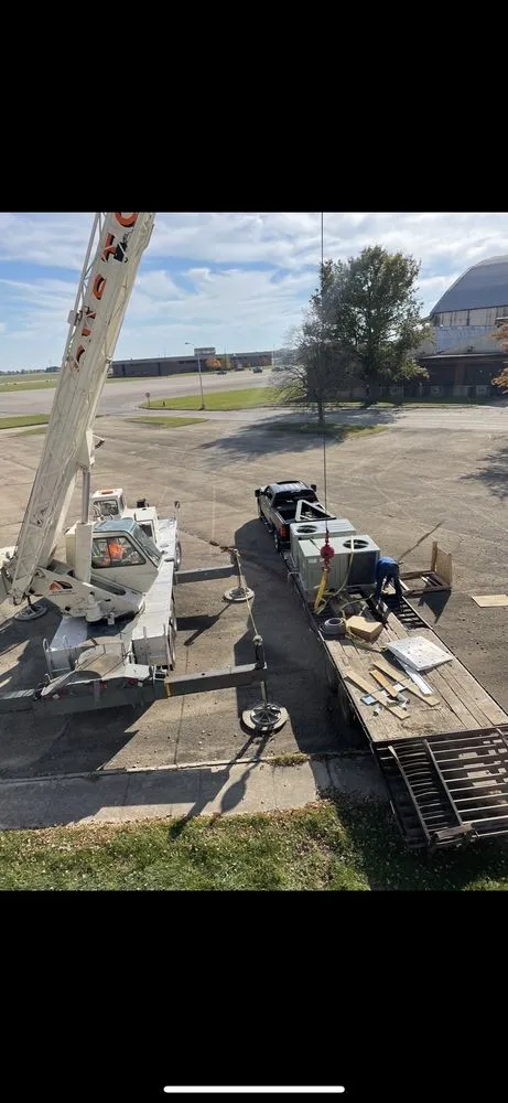 Expert electrician providing panel upgrade in Mansfield, IL - Heiser Heating And Air