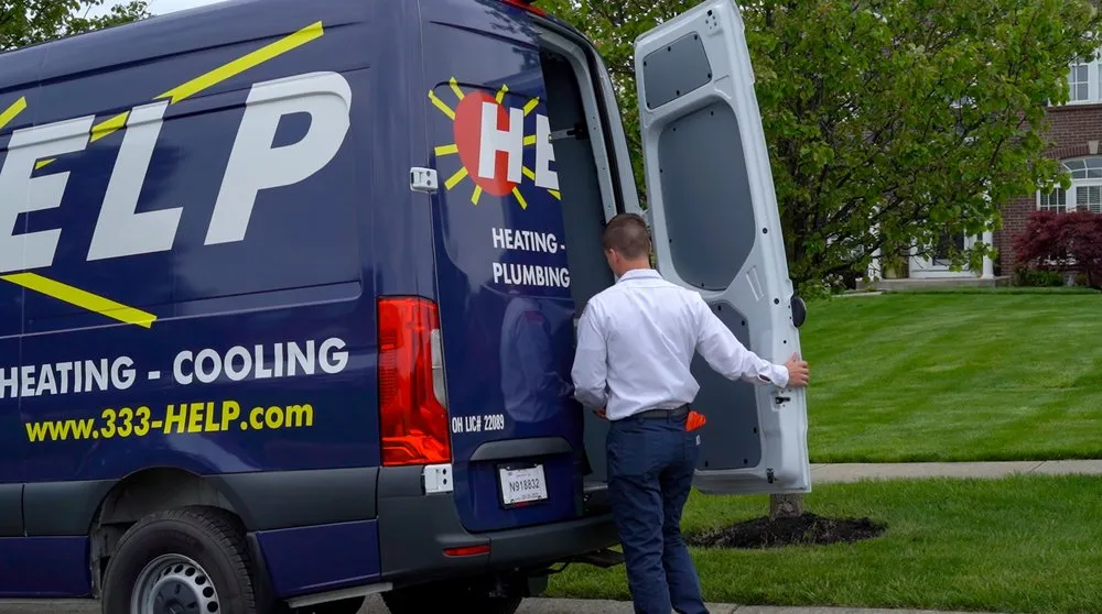 Licensed electrician providing panel upgrade in Cincinnati, OH - HELP Plumbing, Heating, Cooling and Drains
