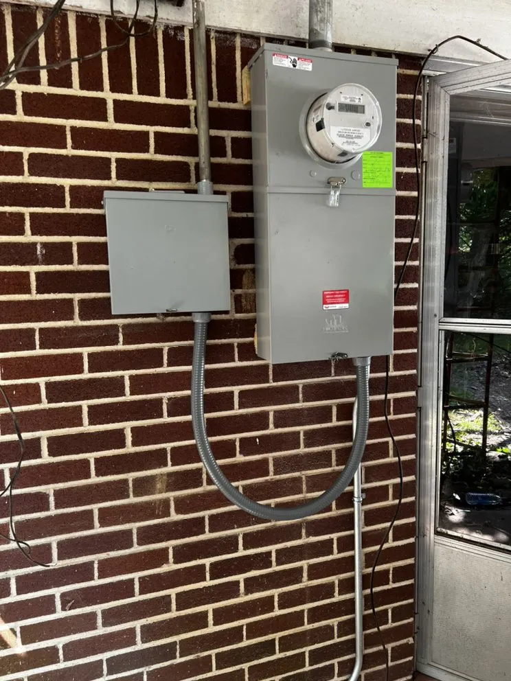 Licensed electrician providing panel upgrade in Many , LA - Hill's Electrical & AC