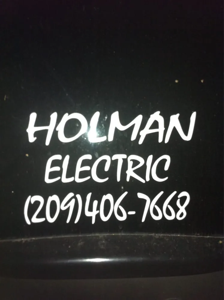 Slide of Holman Electric