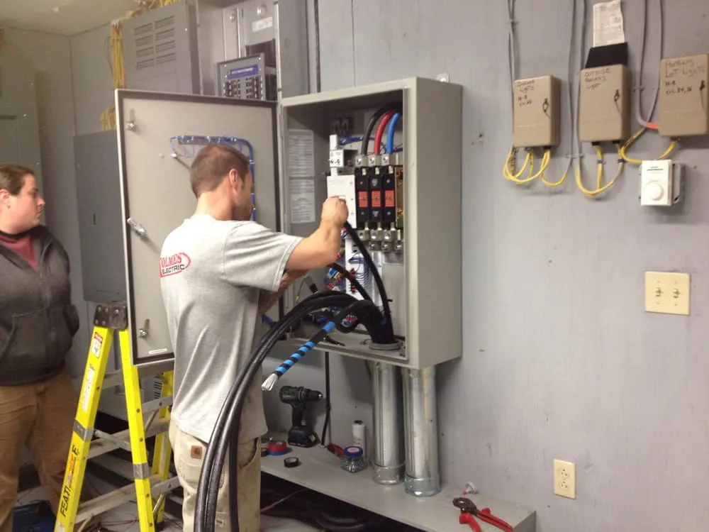 Slide of Holmes Electric