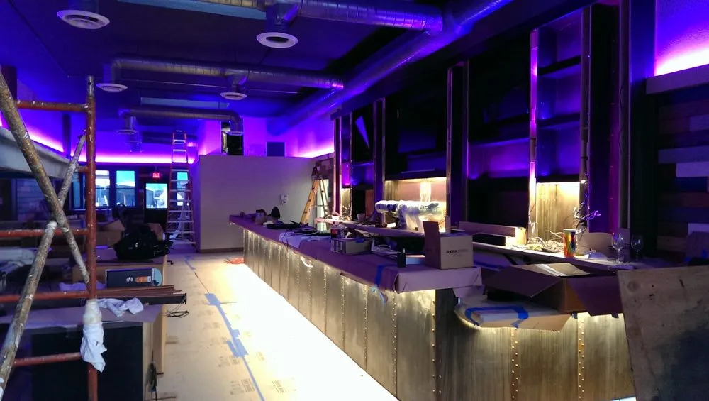 Professional electrician providing lighting installation in , 