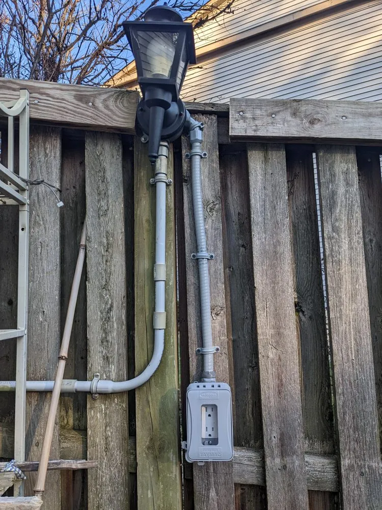 Certified electrician providing panel upgrade in , 