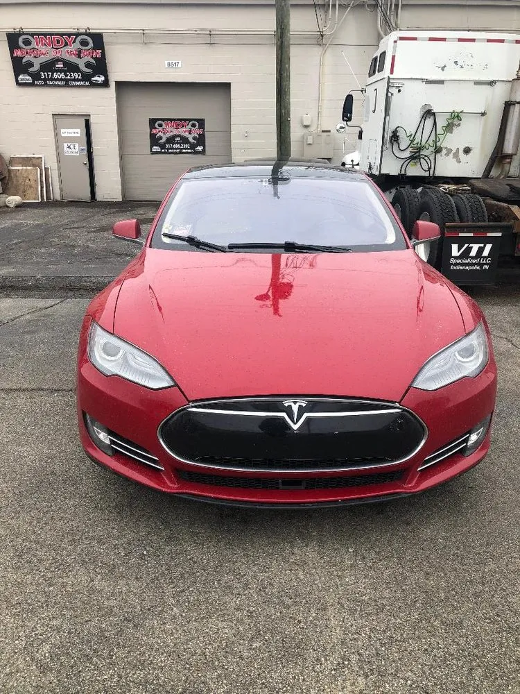 Slide of Indy Mechanic on the Move