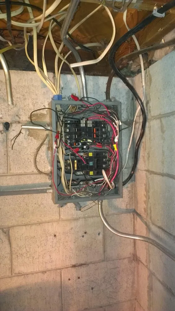 Certified electrician providing panel upgrade in , 