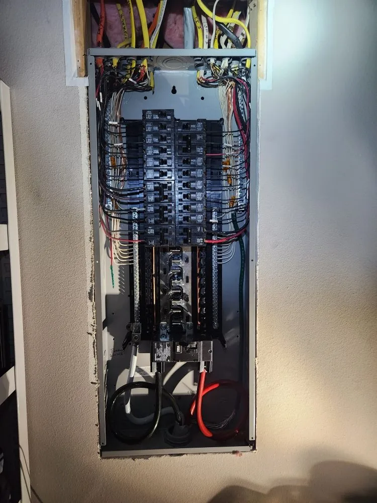 Emergency electrician providing panel upgrade in ,