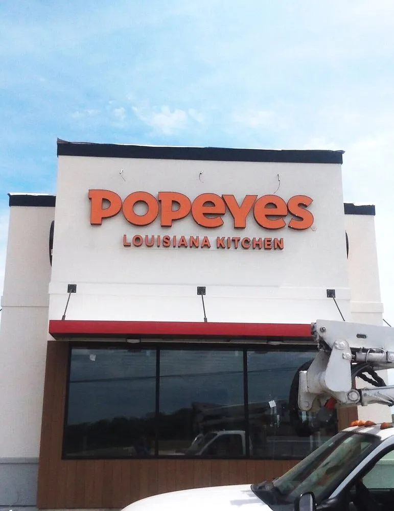 Slide of J & S Electric and Sign