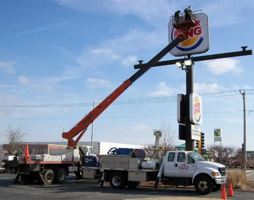 Slide of J & S Electric and Sign